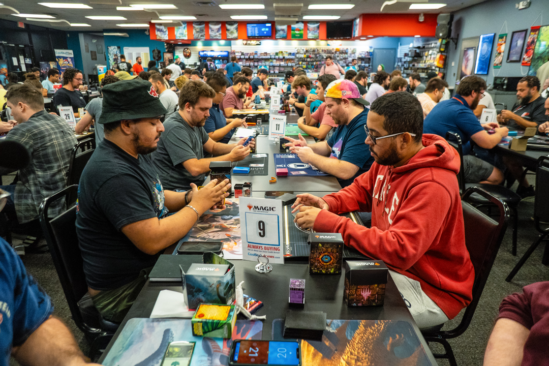 Large crowd of people playing in a Friday Night Magic event at CoolStuffGames Maitland